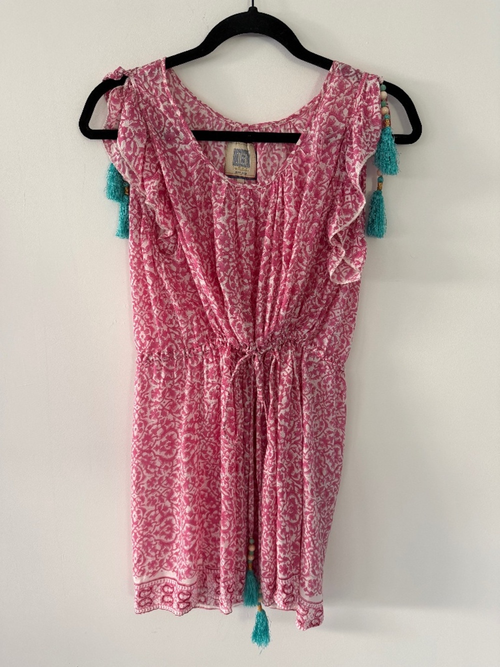 pink Bell mini dress with tassel details